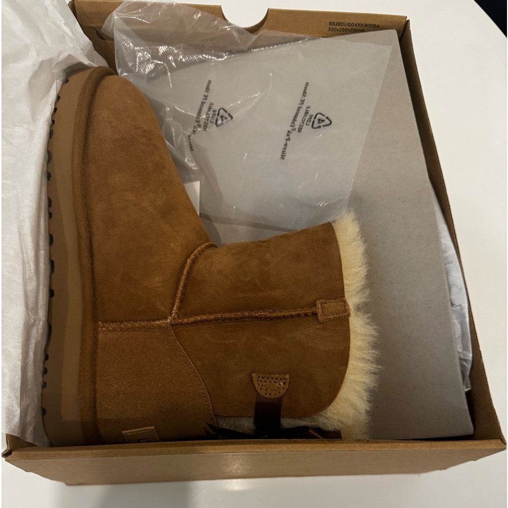 Brand new in box Ugs boot with ribbon tan color